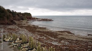 Talland Bay beach Cornwall between Looe and Polperro England UK out of season in winter smooth professional pan