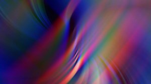 Download Abstract glowing multicolored rainbow background. for free