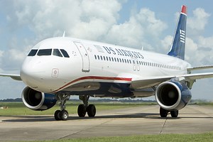 US Airways Plane Diverts Due To Dog Pooping in the Aisle - Points Miles & Martinis