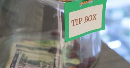 Whitmer signs Michigan's minimum wage, sick leave laws