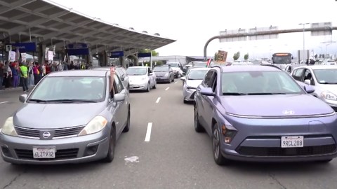 Watch: May Day protest blocks roadway at Oakland San Francisco Bay Airport