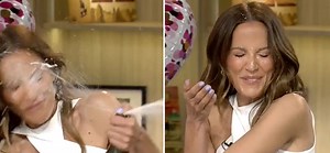 Kay Adams Blasted In the Face By Champagne Bottle Explosion