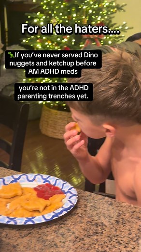 POV: Your kid’s pre-meds breakfast looks like a T-Rex buffet 🦖 📘 Comment “BOOK” below to grab your copy of our e-book Thriving with ADHD — packed with real tools, parent-tested strategies, and the support you actually need to help your ADHD kid thrive. 💛 If you’ve never served Dino nuggets and ketchup before 8 a.m., you’re not in the ADHD parenting trenches yet. Before the comments roll in — yes, that’s Dino nuggets for breakfast. And yes, the iPad’s on. And no, Karen, I don’t need your kale 