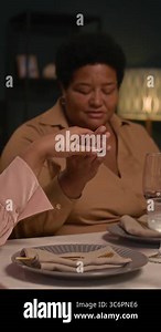 Granny typing on computer keyboard