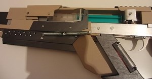 DIY airsoft rifle uses a syringe to shoot BBs