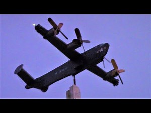 Big homemade wood Whirligig DiY Airplane Four Propellers spinning on Top of Workshop, Windy!