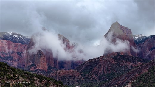 I saw this when driving home, I had to turn back and capture it. On I-15 between Cedar City and St. George is a narrow canyon that is easy to miss as you pass by. But keep your eyes open because it is stunning to see these rocky spires. They are part of the northern part of Zion National Park and named Kolob Canyon. Some beautiful hiking there as well. The storm clouds around these red cliffs were stunning. Using a drone with long telephoto capabilities...plus the ability to zoom in because of h