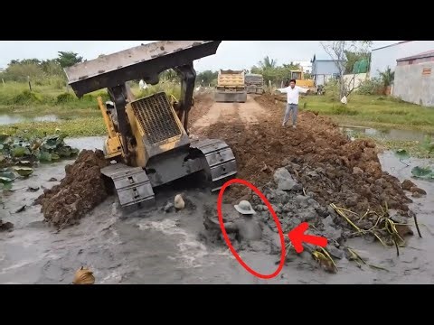 Operation Bulldozer Komatsu D20 transforming a Mud Pit Into the Road in the village