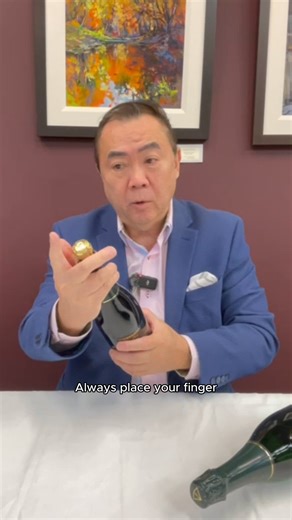 Dr. Lee | Wine & Etiquette🍷 on Instagram: "Popping champagne for New Years? Here's how to do it safely. #APWASI #DrClintonLee #EtiquetteExpert #EtiquetteClass #EtiquetteMatters #EtiquetteElevates #EtiquetteCourse #EtiquetteTips #EtiquetteLessons #DiningEtiquettte"