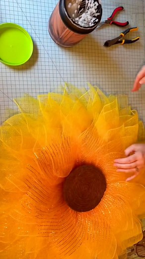 Want to learn how to make a sunflower wreath on a bicycle wheel frame? I’ve got you! I have a tutorial on my YouTube channel. You can find the l!nk to my channel in my b!0, and the direct l!nk to the tutorial in the 1st comment you know where. 👇🏻#SunflowerWreath #DecoMeshWreath #WreathMaking | Tina's Country Door