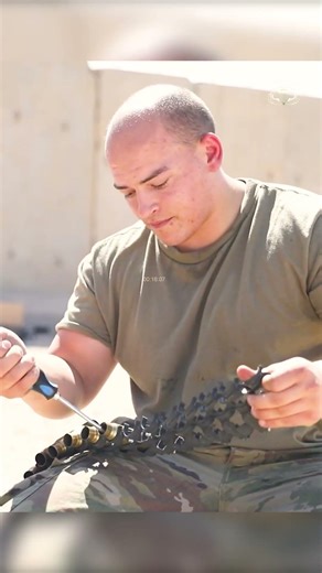 U.S. Soldiers Fire with a Counter- Rocket, Artillery, and Mortar defense system "C-RAM"