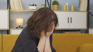 Abandoned woman crying at home.