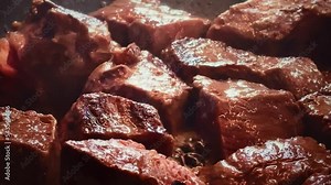 Red meat recipe and food preparation process, cooking beef on frying pan. High quality 4k footage