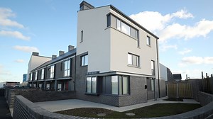 Families given keys to homes as part of housing scheme