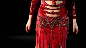 woman dancing in traditional arabic costume