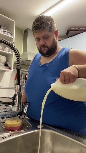 Milk Pouring Process in a Modern Kitchen