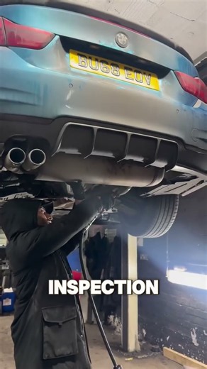 Car exhaust repair gets a clean weld under the lift