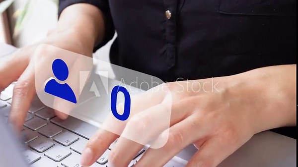Close-up of a businesswoman's hands working on her computer with an animation of increasing friendships or social media followers