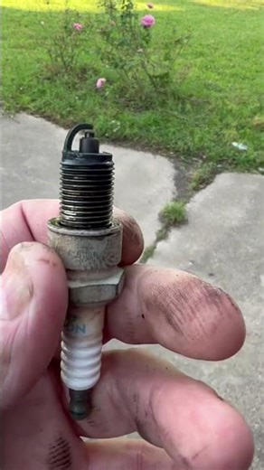 Broken spark plug causes misfire
