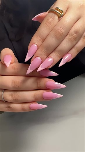 Sarineh | Embrace the fierce elegance of our Pink French Stiletto Nails – where soft pink hues meet razor-sharp tips for a bold, feminine vibe that... | Instagram