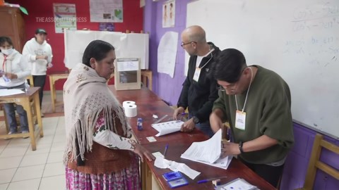 Polls open in Bolivia in tight runoff as voters seek a president to lift them from crisis