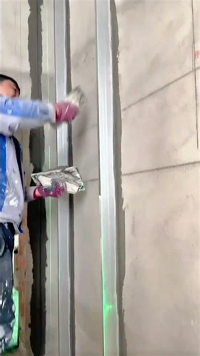 creating guide lines on the wall surface using cement