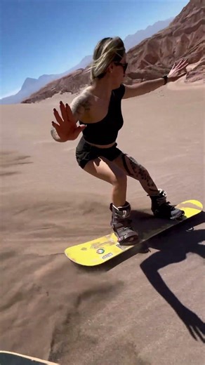 Thrilling Sandboarding Adventure in the Desert