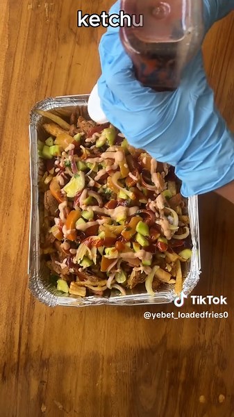 Yebet(የቤት) Loaded Fries Menu: Vegan Loaded Fries Enough for 3 persons Coming soon on BeU Delivery! #Yebet #Ethiopia #SnackLover #FoodHack #FYP #EthiopianFoodie #YebetFries #EthiopianFood #creatorsearchinsight