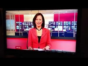 TV Blooper Funny - Newswoman Sneeze repressed pops out!