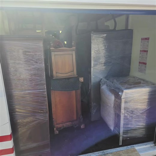 loading a 16ft PODS container WE GET MOVIN'