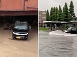Drivers struggle through flooded roads in Kyushu after storms