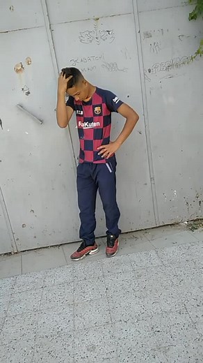 Urban Style: Sporty Outfits in Graffiti Settings