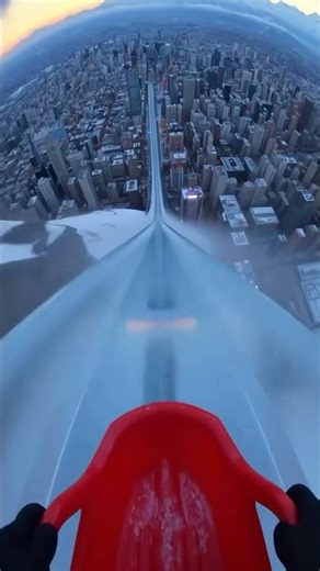 When you think it’s just a slide… until you drop from an ice skyscraper.