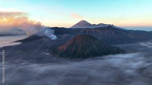 Bromo volcano iconic aerial view at sunrise, tourism in Java Indonesia, South East Asia travel