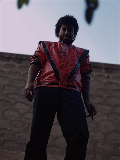 Michael Jackson Thriller Jacket | MJ Red Leather Outfit Michael Jackson's Thriller jacket is the iconic candy-apple red leather jacket with black stripes from the 1983