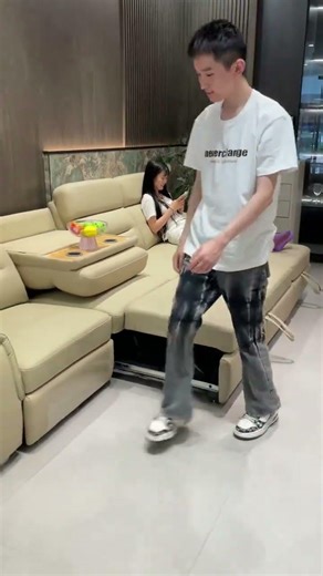 The Living Room Hero: Brownish-Yellow 5-Seat Power Recliner with Built-In Table & Pull-Out Bed