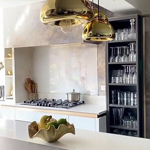 52K views · 68 reactions | Milano Ultra makes the ultimate handleless kitchen. ✨ Infinity Plus Milano cabinets in Bianco, framed with metallic copper profiles and a Crystal White worktop, creates a glamorous kitchen space. Completing this luxe look are the matching metallic accessories and gold pendant light. : @cmyobode #wrenovation #wrenkitchens #kitcheninspo #kitchendecor #modernkitchen #whitekitchen #milanokitchen | Wren Kitchens | Facebook