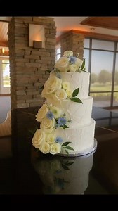 24 reactions | This stunning three-tier wedding cake, dressed in...