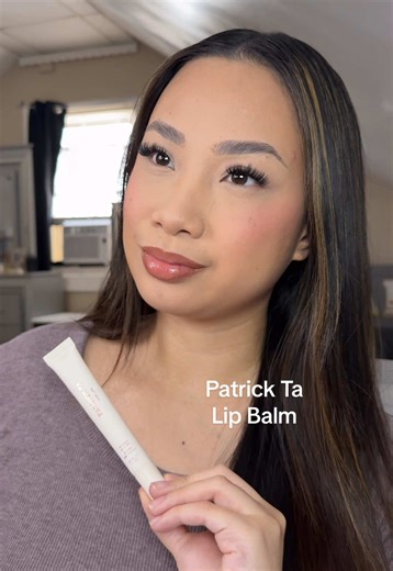 New @Patrick Ta Beauty Major Moisture Smoothing and Hydrating Lip Balm. Using shade ‘cocoa butter’ 🤍 it smells exactly like the name! So yum 🤤 also, who’s excited for the new concealer? 🙋🏻‍♀️ @patrick ta #newmakeup #lipbalm #patricktabeauty