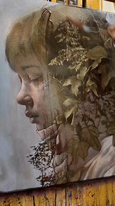 378K views · 9.1K reactions | Intense and evocative. Enamored by the hauntingly beautiful ideations of Lo Chan Peng @lochanpeng. "A girl who hasn‘t moved for a hundred years, until plants have covered her." #beautifulbizarre #art #artist #realism #contemporaryart #painting #lochanpeng #artprocess #artreels #artinspo #plants #realism | Beautiful Bizarre Magazine | Facebook