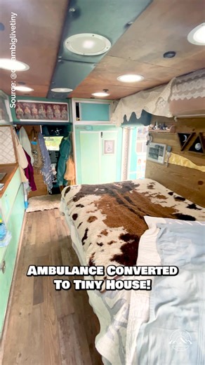 Would you live & travel in this ambulance converted into a tiny house? This is a renovated 2015 Duramax Diesel Ambulance converted over the course of a year in San Diego, CA by @artbyadelaide! This is her full-time home on the road as an artist! Inside, there is a small kitchen with a Dometic fridge, sink, 2-burner propane cooktop, & tons of storage; a sleeping area with a double bed; & a composting toilet! #tinyhouse #tinyhome #vanlife #camper #skoolie | Dream Big Live Tiny Co.