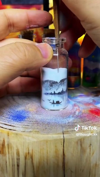 Drawing Art in a Bottle with Sand
