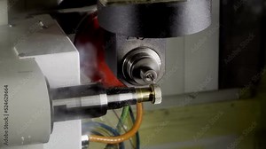 Modern jewelry technologies. The CNC machine applies a pattern to the gold jewelry (ring). Automated production. Making rings. Making jewelry. Production of precious jewelry.