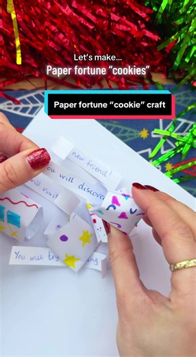 Looking for a cosy craft for these in-between days after Christmas and before the New Year? Here’s a simple one: paper fortune cookies. Decorate and cut out circles of paper, add a handwritten fortune on a small strip, and fold into place. Add dabs of glue to hold it in place, and gently squeeze to get that “fortune cookie” shape. They make sweet table settings, party favors, or just a relaxed family activity while looking toward 2026. Happy crafting and happy (almost!) New Year. #kidscraftideas