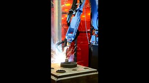Look at those sparks fly! Our MH50-20 robot is welding circles around an oil filter recycler with the help of ComArc seam tracking. To learn more about this robot, ComArc and all our welding technologies, check out our webpage: http://ow.ly/JBD9i | Yaskawa Motoman