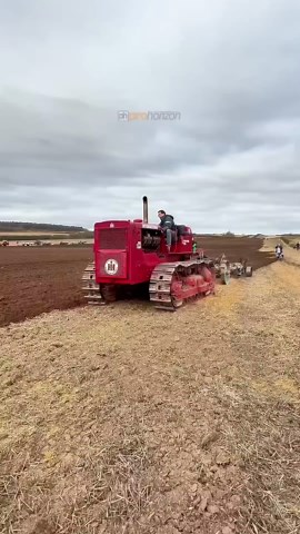 Two International Crawler Tractors Working the Land