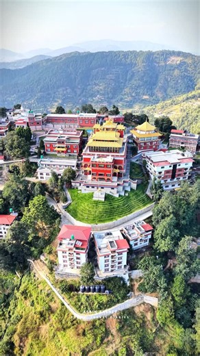 Namobuddha is a serene hilltop located about 40 km southeast of Kathmandu, known for its spiritual calm and stunning mountain scenery. It’s one of Nepal’s most sacred Buddhist pilgrimage sites, believed to be the place where Lord Buddha, in a previous life, offered his body to a hungry tigress and her cubs. The main attraction is the Thrangu Tashi Yangtse Monastery, a beautifully built monastery where monks chant prayers daily. Visitors can also explore the sacred stupa, enjoy panoramic views of