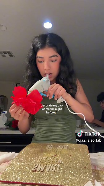 I literally ruined my cap but my mama and tia saved it😭 #fail #cap #cap decorating #senioryear #graduate #fypage #diy