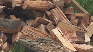 Lumberjack cutting wood logs with axe, man splitting firewood for winter season. Stock Video