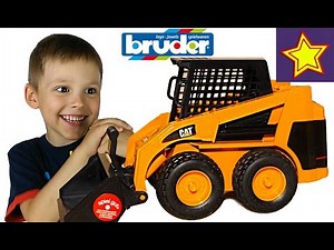 Bruder погрузчик CAT. Рабочие машины для детей Bruder Cat Loader uboxing